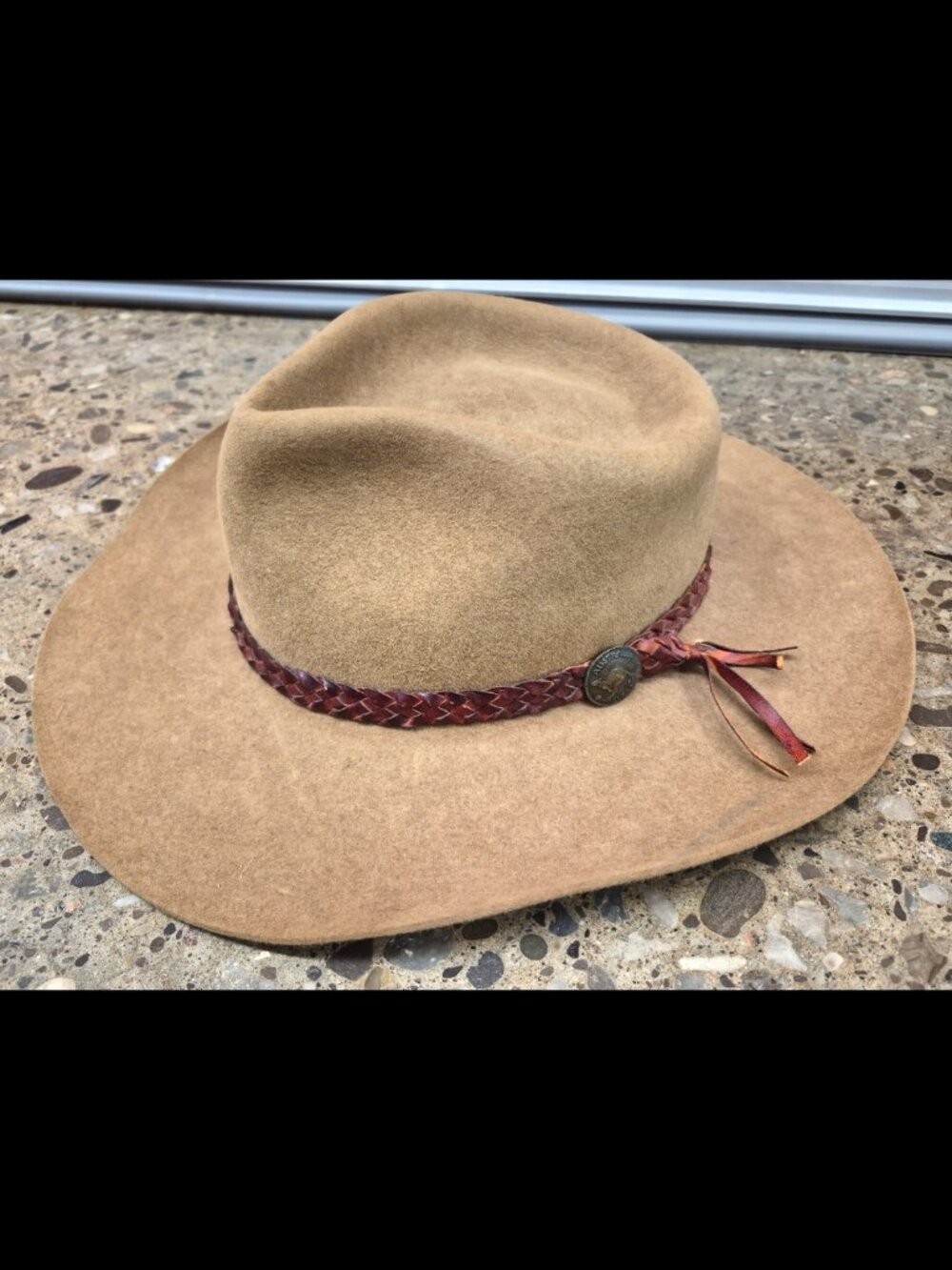 Akubra Snowy River pure fur felt hat interior, featuring a white satin lining.